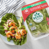 Shrimp Lettuce Wraps next to a package of Revol Greens Organic Romaine Twins