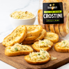 Kowalski's Italian Herb Crostini topped with our Signature Salsa di Parmigiano Spread from the Deli Grab & Go Case