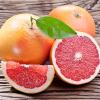Two Grapefruit and One Sliced Open