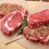 A picture of seasoned steaks.