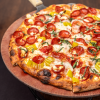 Pezzo Coal-Fired Pizza with Cupping Pepperoni and Pepperoncini