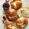 Fresh-baked croissants with jam